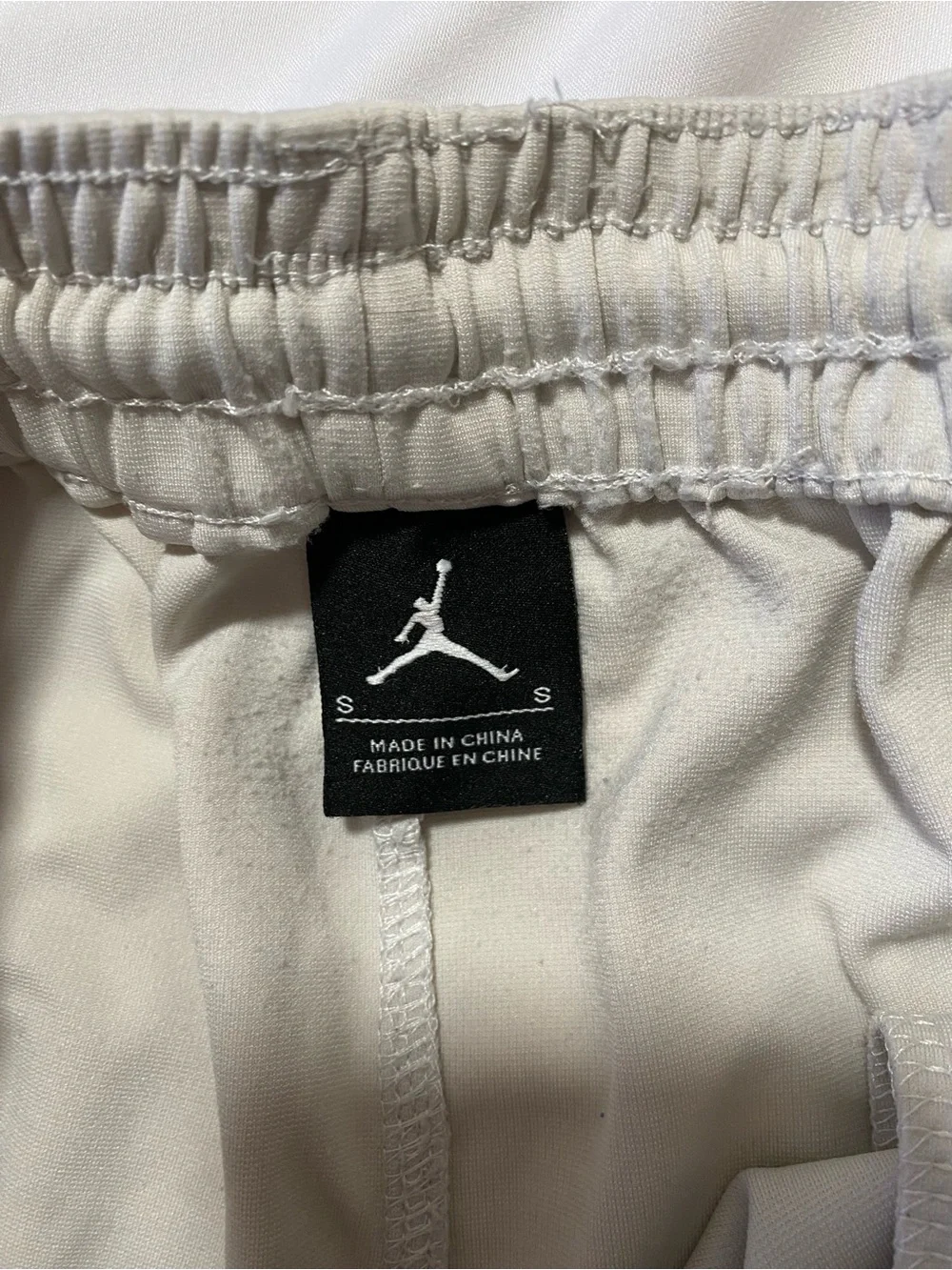 Jordan Men's Light Gray Athletic Shorts with Black Jumpman and Black-Red Trim
